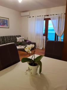 Postel nebo postele na pokoji v ubytování Apartman Ada