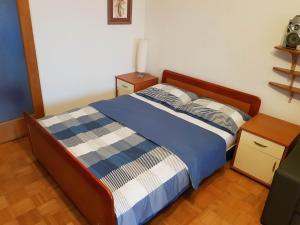 Postel nebo postele na pokoji v ubytování Apartman Ada