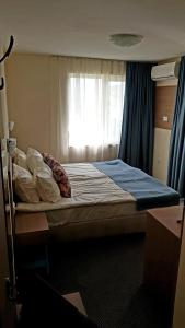 Postel nebo postele na pokoji v ubytování АМИДА