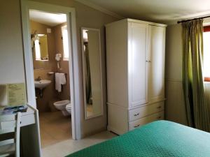 Ванная комната в Hotel Villa Fiorita