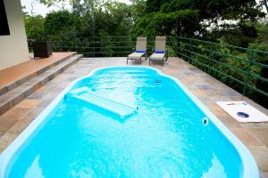 Swimmingpoolen hos eller tæt på Tropical Paradise Villa - Beautiful Pool, Surrounded by Nature and Wildlife!