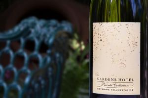 a bottle of wine with a label on it at The Gardens Hotel in Key West