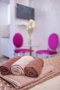 Кровать или кровати в номере Luxury Boutique Studio Apartments