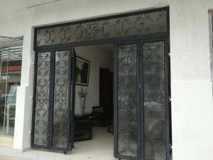 an entrance to a building with a glass door at Mi Bella Santa Cruz in Santa Cruz de la Sierra