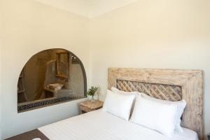 Postel nebo postele na pokoji v ubytování Elixirium villa
