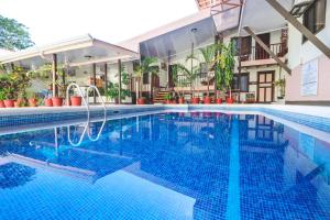 Bazén v ubytování Hotel Flor Blanca nebo v jeho okolí