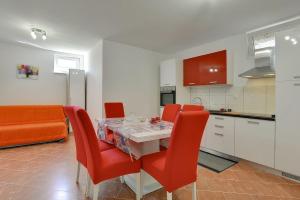 Kuchyň nebo kuchyňský kout v ubytování Apartments Elviana