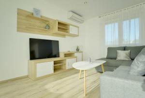 TV a/nebo společenská místnost v ubytování Holiday Home Bellissima