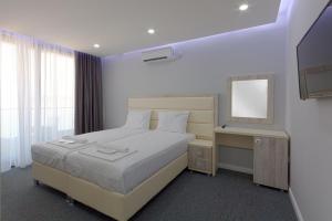 Voodi või voodid majutusasutuse Guesthouse Montex toas