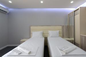 Voodi või voodid majutusasutuse Guesthouse Montex toas