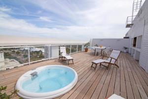 Uma varanda ou terraço em Yoo Punta del Este - Rental Club Apartments