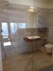 Koupelna v ubytování Guest House Vidlauči