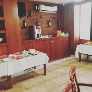 Kuchyň nebo kuchyňský kout v ubytování Harmony Hotel