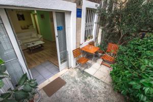 Vonkajšia záhrada v ubytovaní Apartment Skeja