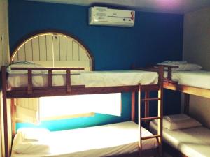 Postel nebo postele na pokoji v ubytování Cosmopolitan Hostel