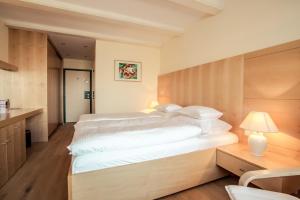 Voodi või voodid majutusasutuse Hotel garni Kranzbichlhof toas