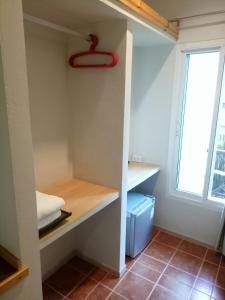 Postel nebo postele na pokoji v ubytování Baan Jaru