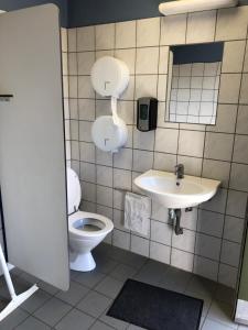 Koupelna v ubytování HYGGE Strand Camping + 37 fotografií