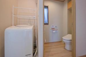 Koupelna v ubytování Kyo Machiya Ryokan Yuan + 37 fotografií