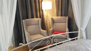 Postel nebo postele na pokoji v ubytování Boutique Hotel Kugel Wien