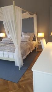 Postel nebo postele na pokoji v ubytování Boutique Hotel Kugel Wien