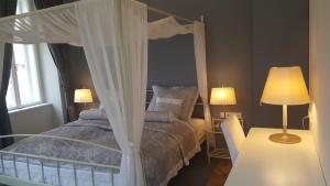 Postel nebo postele na pokoji v ubytování Boutique Hotel Kugel Wien
