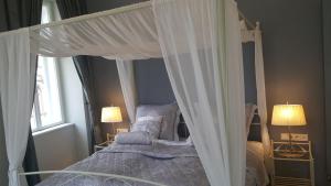 Postel nebo postele na pokoji v ubytování Boutique Hotel Kugel Wien