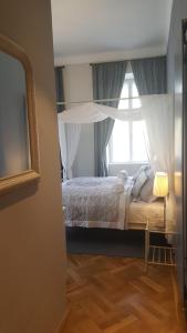 Postel nebo postele na pokoji v ubytování Boutique Hotel Kugel Wien