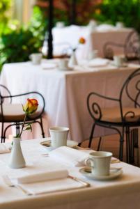 Reštaurácia alebo iné gastronomické zariadenie v ubytovaní Starhotels Cristallo Palace