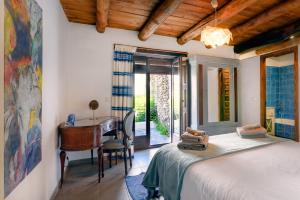 Postel nebo postele na pokoji v ubytování Casa Cecilia