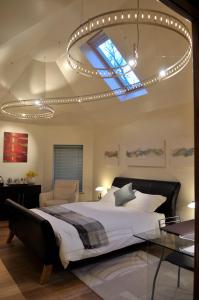 A bed or beds in a room at South Lodge 