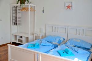Postel nebo postele na pokoji v ubytování Vila Kateřina