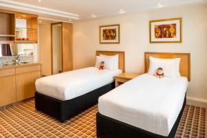 Postel nebo postele na pokoji v ubytování Copthorne Tara Hotel London Kensington