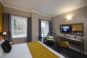 TV a/nebo společenská místnost v ubytování New Lanark Mill Hotel