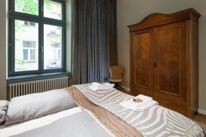 Postel nebo postele na pokoji v ubytování apartament PAULOVE