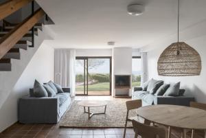 A seating area at Hotel Es Blau Des Nord