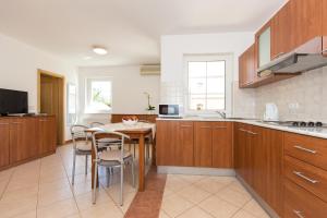 Kuchyň nebo kuchyňský kout v ubytování Apartments Isabela Punat by El-Pi Tours