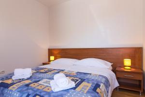 Postel nebo postele na pokoji v ubytování Apartments Isabela Punat by El-Pi Tours