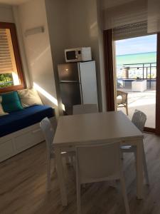 A kitchen or kitchenette at Appartamenti FronteMare