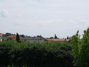 a view of the city from the bushes at Cabà Holiday Bardolino Gritti in Bardolino