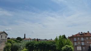 a view of a city with buildings and trees at Cabà Holiday Bardolino Gritti in Bardolino