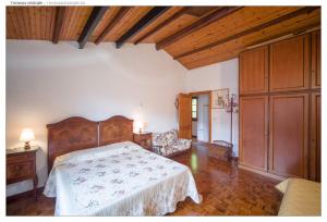 Voodi või voodid majutusasutuse Rifugio Valentina toas