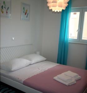Posteľ alebo postele v izbe v ubytovaní Apartman Matea