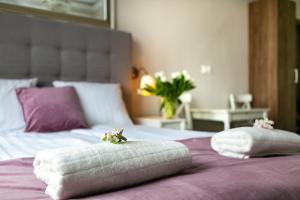 Posteľ alebo postele v izbe v ubytovaní Apartamenty Wrona | Wrona Apartments