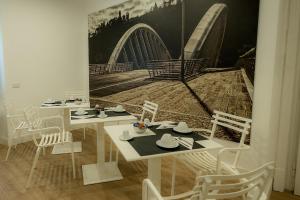 Reštaurácia alebo iné gastronomické zariadenie v ubytovaní Suite Pinturicchio