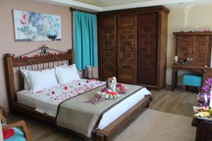 Postel nebo postele na pokoji v ubytování Lissiya Hotel