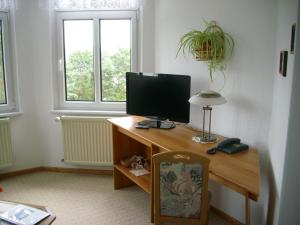 TV a/nebo společenská místnost v ubytování Hotel Nordlicht