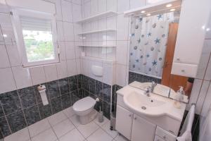 Kúpeľňa v ubytovaní Apartment Empire + 37 fotografií
