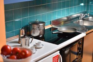 Kuchyň nebo kuchyňský kout v ubytování Casa Cola + 37 fotografií