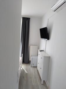 TV a/nebo společenská místnost v ubytování Marko Rooms